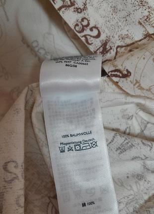 Непревзойденная рубашка бежевого цвета с принтом eddie bauer made in madagascar7 фото