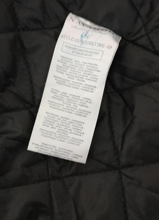 Женская зимняя стеганая куртка на теплой подкладке чёрного цвета navahoo10 фото