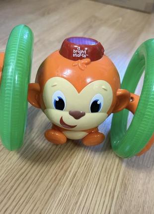 Развивающая игрушка bright starts "обезьянка на кольцах"