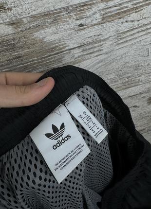 Мужские нейлоновые спортивные штаны adidas с лампасами swoosh tech fleece брюки7 фото