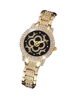 Жіночий кварцовий наручний годинник золотистий на чорному циферблаті конюшина чотирилистий сталевий ремінець2 фото