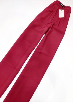 Бордовые широкие брюки с карманами3 фото