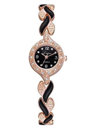 Жіночий кварцовий наручний годинник золотистий на чорному циферблаті чорно-золотистий сталевий ремінець1 фото
