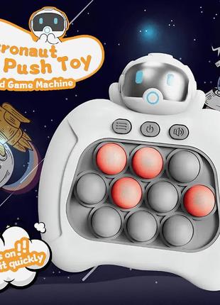 Портативна електронна консоль quick push: антистресова інтерактивна іграшка космонавт pop it pro