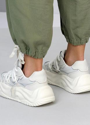 Натуральні шкіряні білі кеди - кросівки на високій підошві10 фото