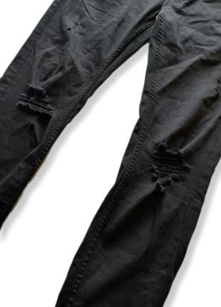 Рваные стрейчевые джинсы с потертостями5 фото