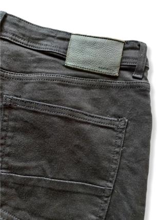 Рвані стрейчеві джинси з потертостями7 фото