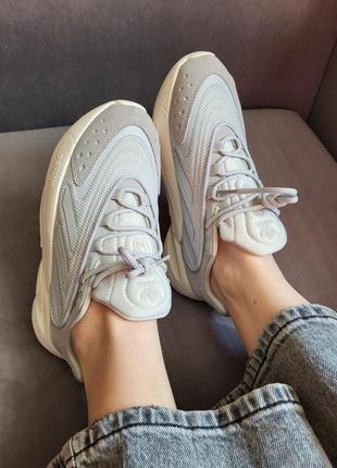 Женские кроссовки серые adidas ozelia grey