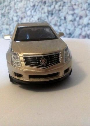 Каділак срх cadillac srx джип машинка метал 1:43