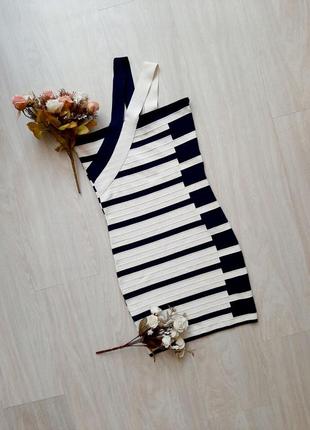 Красиве коротке біле плаття з синіми смужками як піаніно3 фото