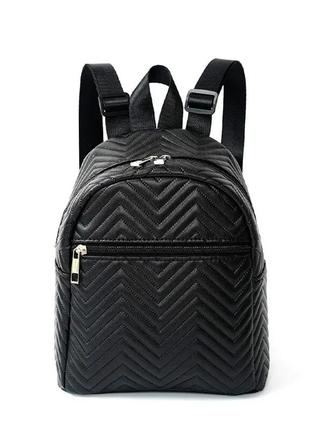 Стильный женский рюкзак чёрного цвета.