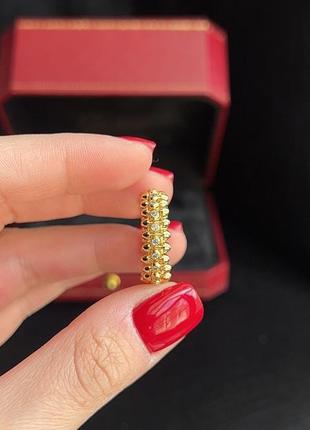 Брендовое кольцо в лимонном золоте с камнями2 фото