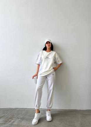 Женский летний трендовый комбинированный спортивный костюм штаны с футболкой размеры 42-483 фото