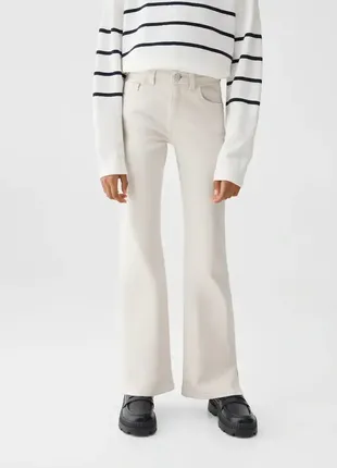 Белые новые бежевые брюки джинсы с разрезами5 фото