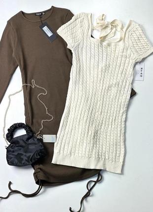 Молочна коротка в'язана мініплаття з розрізом на спині