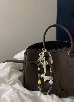 Прикраса з намистин на сумку в стилі tsvite teren1 фото