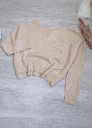 Сливочный шерстяной женственный свитер с красивым бантом на спинке3 фото