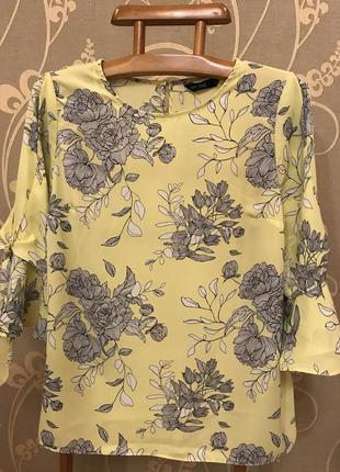 Очень красивая и стильная брендовая блузка в цветах.8 фото