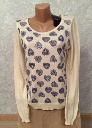 Кофточка в сердечках