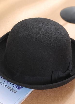 Фетровий капелюх жіночий казанок з бантиком чорна5 фото