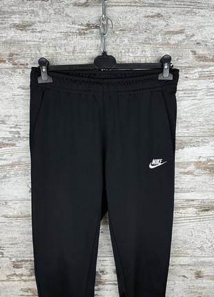 Мужские спортивные штаны nike swoosh dri fit tech fleece modern брюки с лампасами2 фото