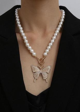 Підвіска з метеликом.