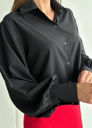 Укорочена блузка чорного кольору розмір 42-4410 фото