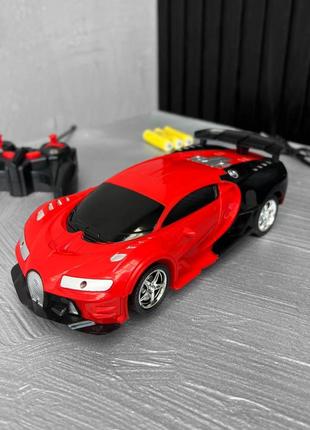 Машинка трансформер bugatti robot car size 1:183 фото