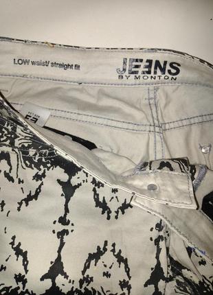 Серо-черные джинсы в разводах2 фото