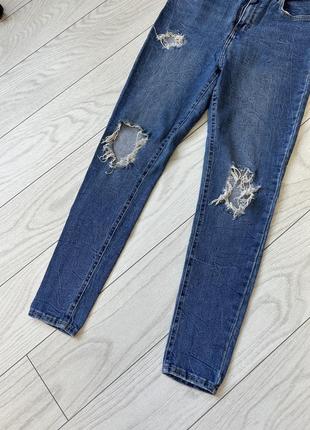 Рваные джинсы2 фото