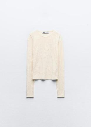 Трикотажний светр із плямистою текстурою7 фото