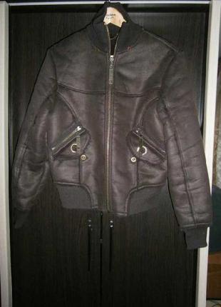 Тепла жіноча курточка з штучного дубляжу 48р б/у1 фото