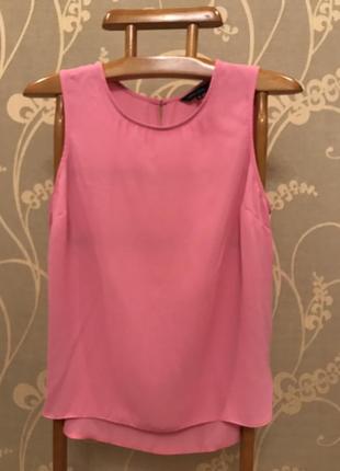 Очень красивая и стильная брендовая блузка розового цвета.1 фото