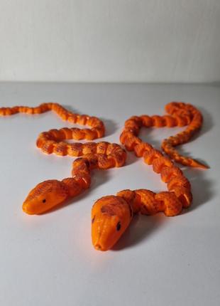 Змея игрушка золотопуза