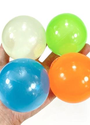 Липкі кульки, що світяться globbles resteq 4 шт. липкі кулі globbles. світиться кульки. іграшка-антистрес 6.5 см9 фото