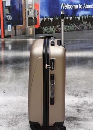 Великий міцний валізу wings champagne10 фото