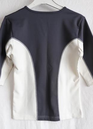 Гарна жіноча спортивна футболка кофта розмір s 44 ог84 см лайкра 14% сіра короткий рукав фітнес біг5 фото