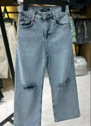 Очень стильные рваные джинсы палаццо для девочки