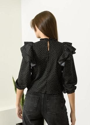 Женская блуза в горох с объемным укороченным рукавом2 фото