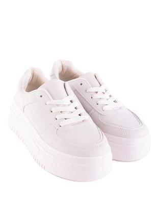 Жіночі білі кросівки на шнурівці1 фото