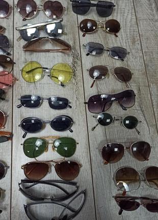Детские очки от солнца в пластиковых и металлических оправах9 фото