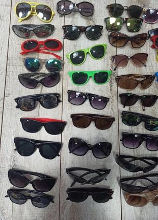 Детские очки от солнца в пластиковых и металлических оправах5 фото