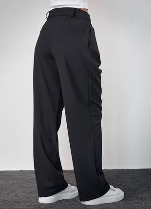 Женские брюки палаццо с интересным кроем / весна 20243 фото
