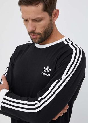 Черный лонгслив с полосками adidas originals7 фото