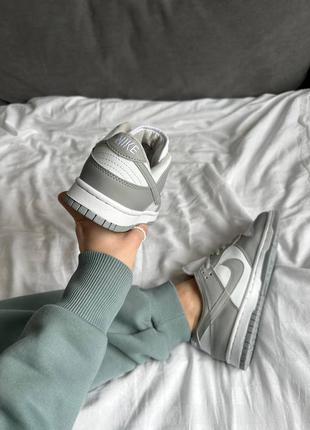 Женские кроссовки серые с белым nike dunk low light grey6 фото