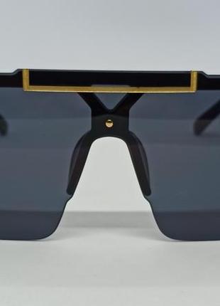 Очки в стиле versace маска женские солнцезащитные черные с золотым логотипом2 фото
