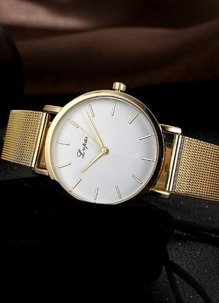 Женские наручные часы с позолотой6 фото