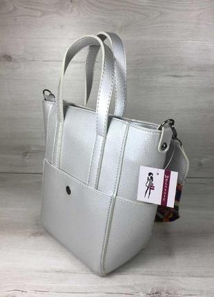 Молодіжна жіноча сумка мілана з яскравим ременем срібного кольору2 фото