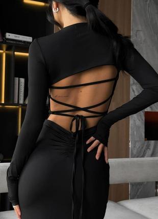 Женское стильное облегающее длинное черное платье с завязками на спинке и разрезом на ножке трендово2 фото