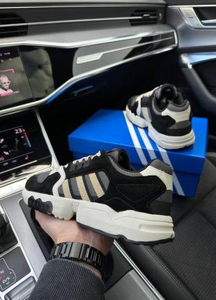 Мужские кроссовки adidas originals zx torsion black sand6 фото